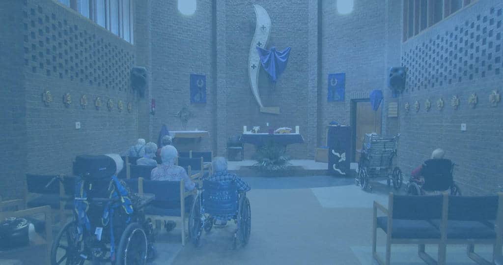 photo of residents attending service in the Marianhill chapel
